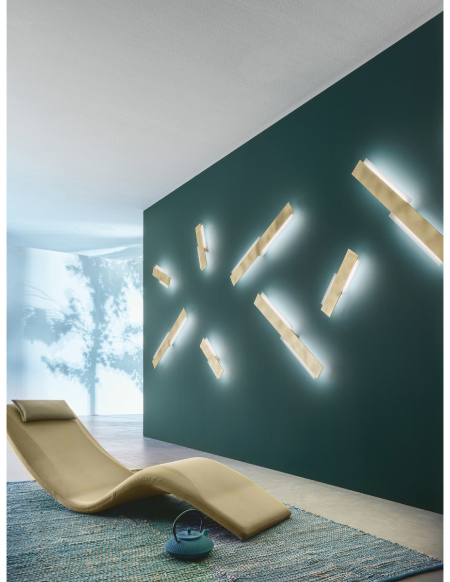 Luminaires design pour grande hauteur sous plafond | Otoko.fr Une image contenant texteDescription générée automatiquement