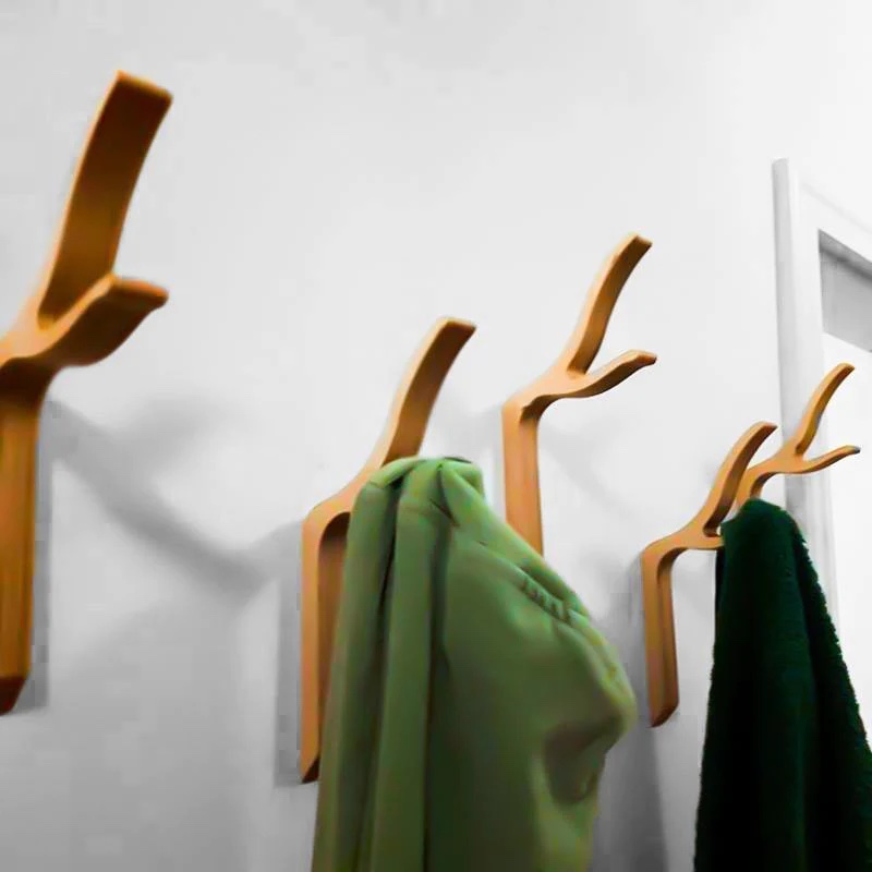 Patères murales en bois : ajoutez une touche naturelle et pratique à votre intérieur Patère en bois design