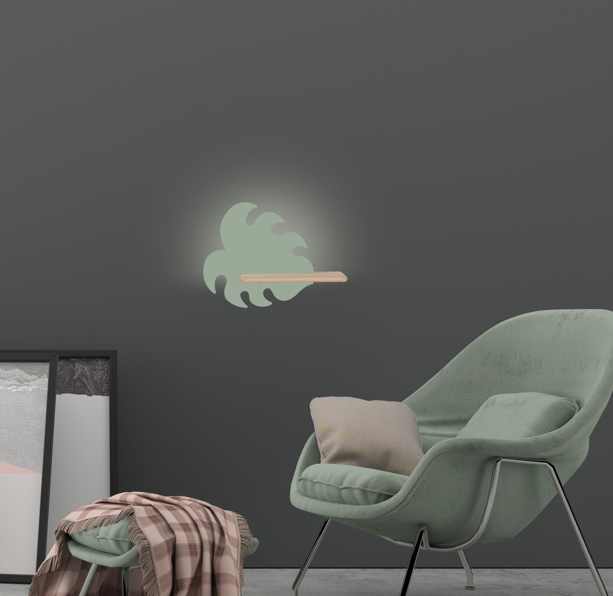 Applique murale feuille tropicale en bois pour chambre d'enfant, LED applique murale feuille enfant vert sauge dans un salon avec fauteuil