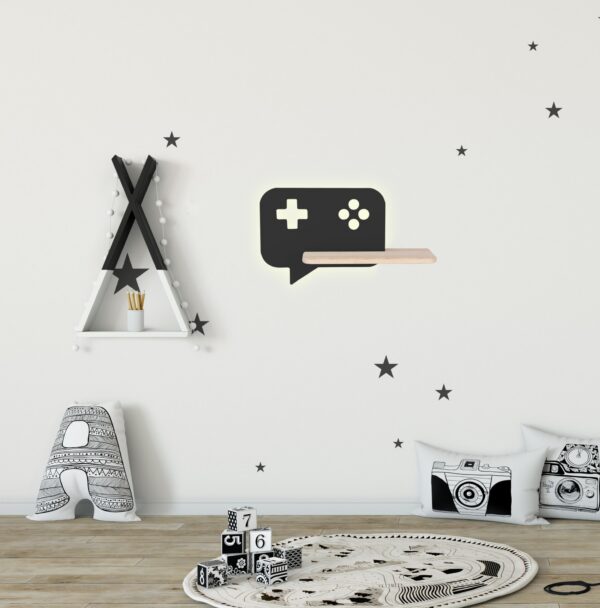 applique murale manette de jeu manette de jeu noire dans une chambre enfant