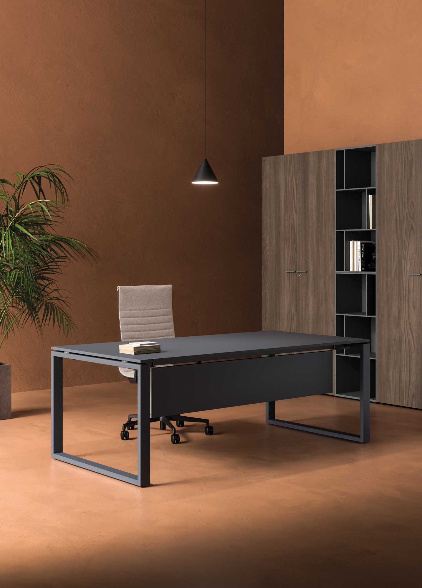 Bureau Loopy par Bralco, piètement en cadre fermé, 140 à 200 cm bureau Loopy Bralco anthracite avec gonne et piètement en cadre fermé dans un bureau terracotta