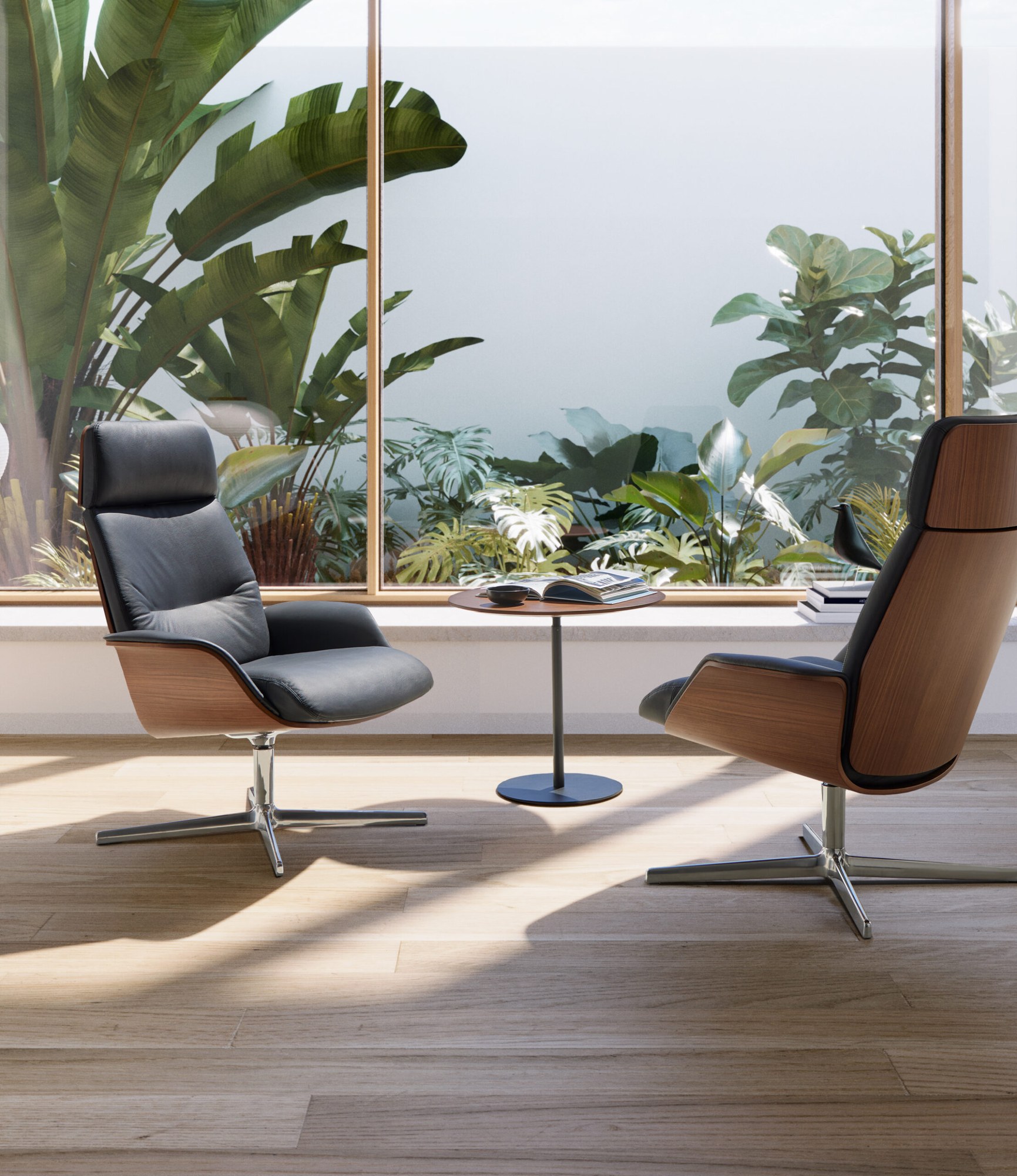 Fauteuil lounge pivotant Rever par Inclass, design Mario Ruiz fauteuil lounge pivotant Inclass Rever, deux fauteuils en cuir noir face à un jardin