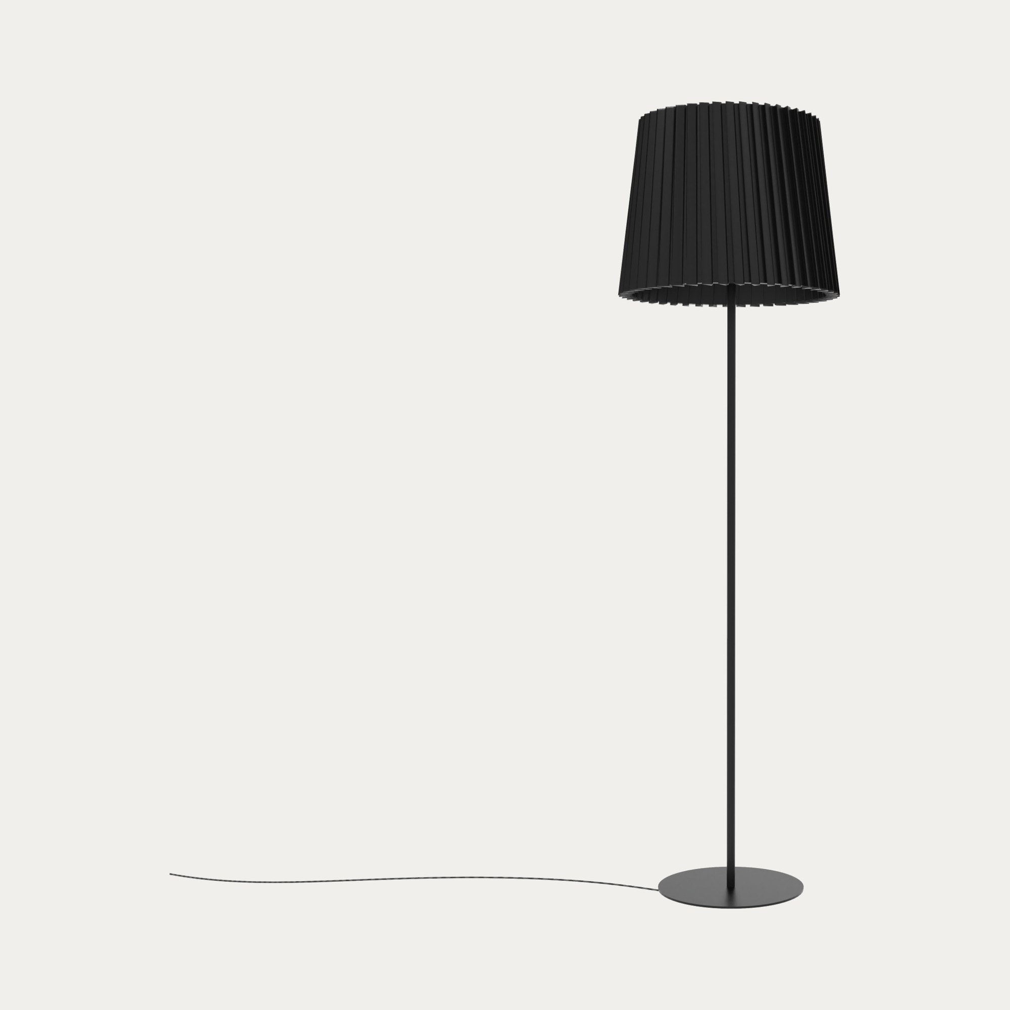 Lampadaire Kilma abat-jour plissé par Robin Lamps lampadaire Kilma noir mat avec abat-jour plissé en tissu, vue de face sur fond beige