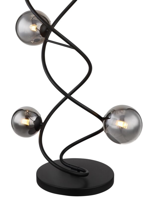 lampadaire spirale verre fumé gros plan sur la base ronde et le départ de la spirale