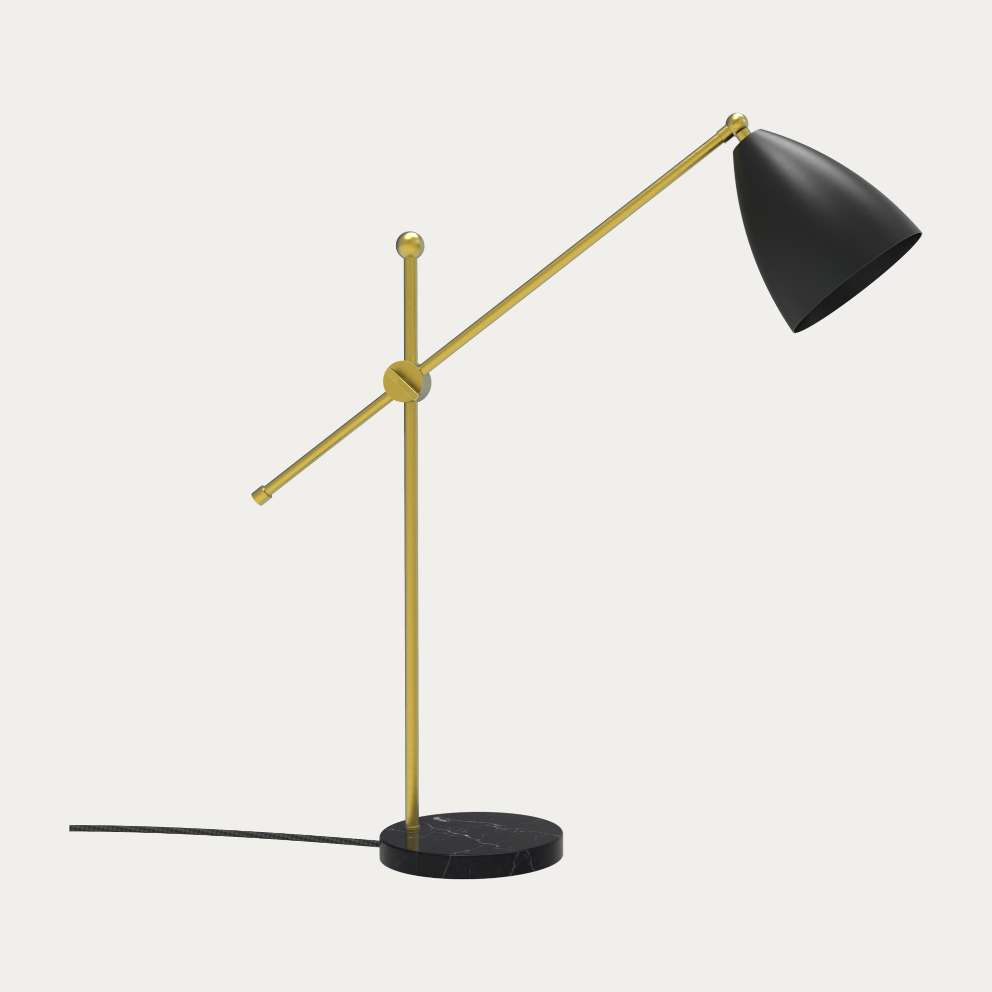 Lampe à poser Nala en laiton et marbre par Robin Lamps lampe à poser Nala noir mat et laiton, vue générale sur fond beige