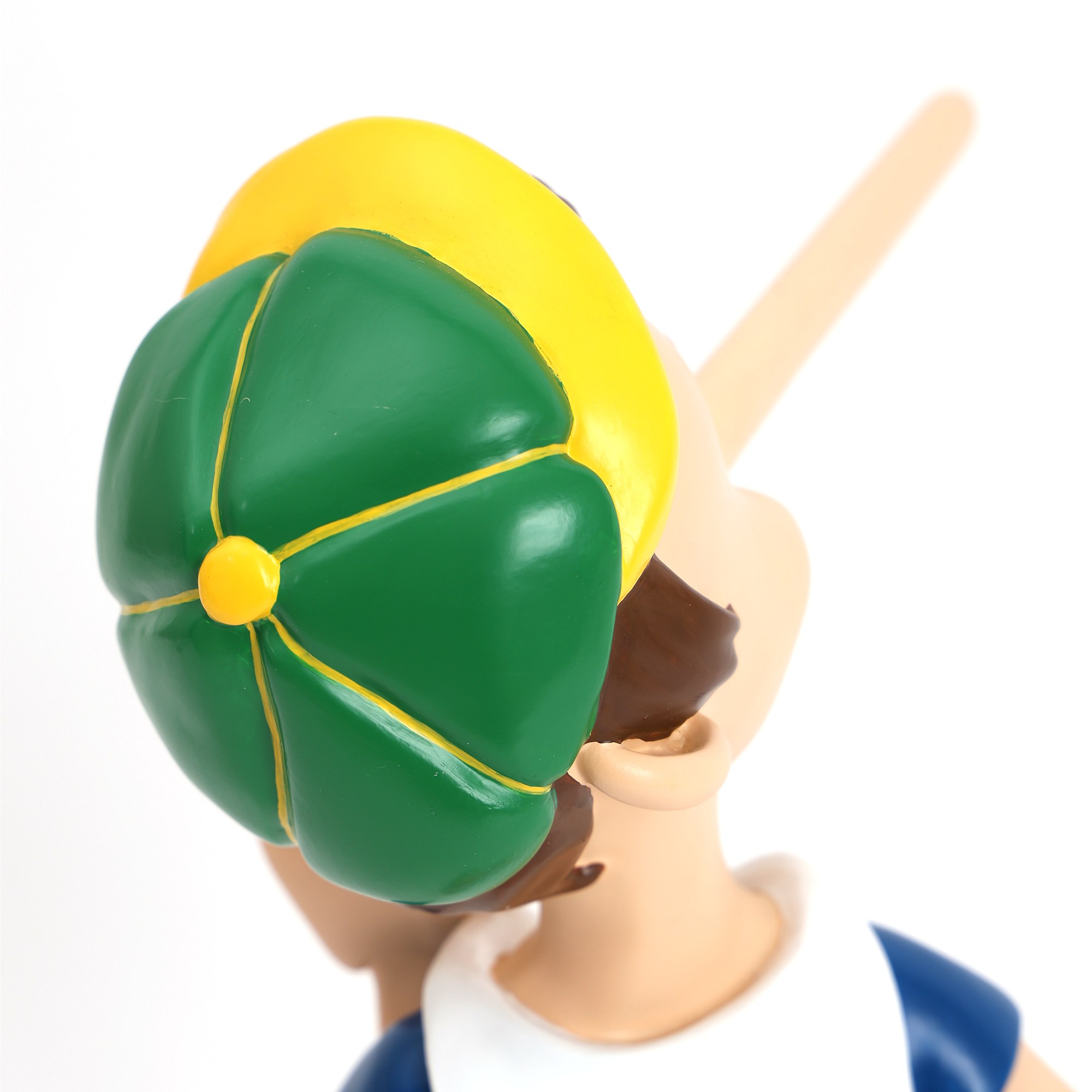 Lampe Pinocchio The Liar rechargeable par Seletti Casquette verte et jaune de la lampe Pinocchio Seletti, vue arrière