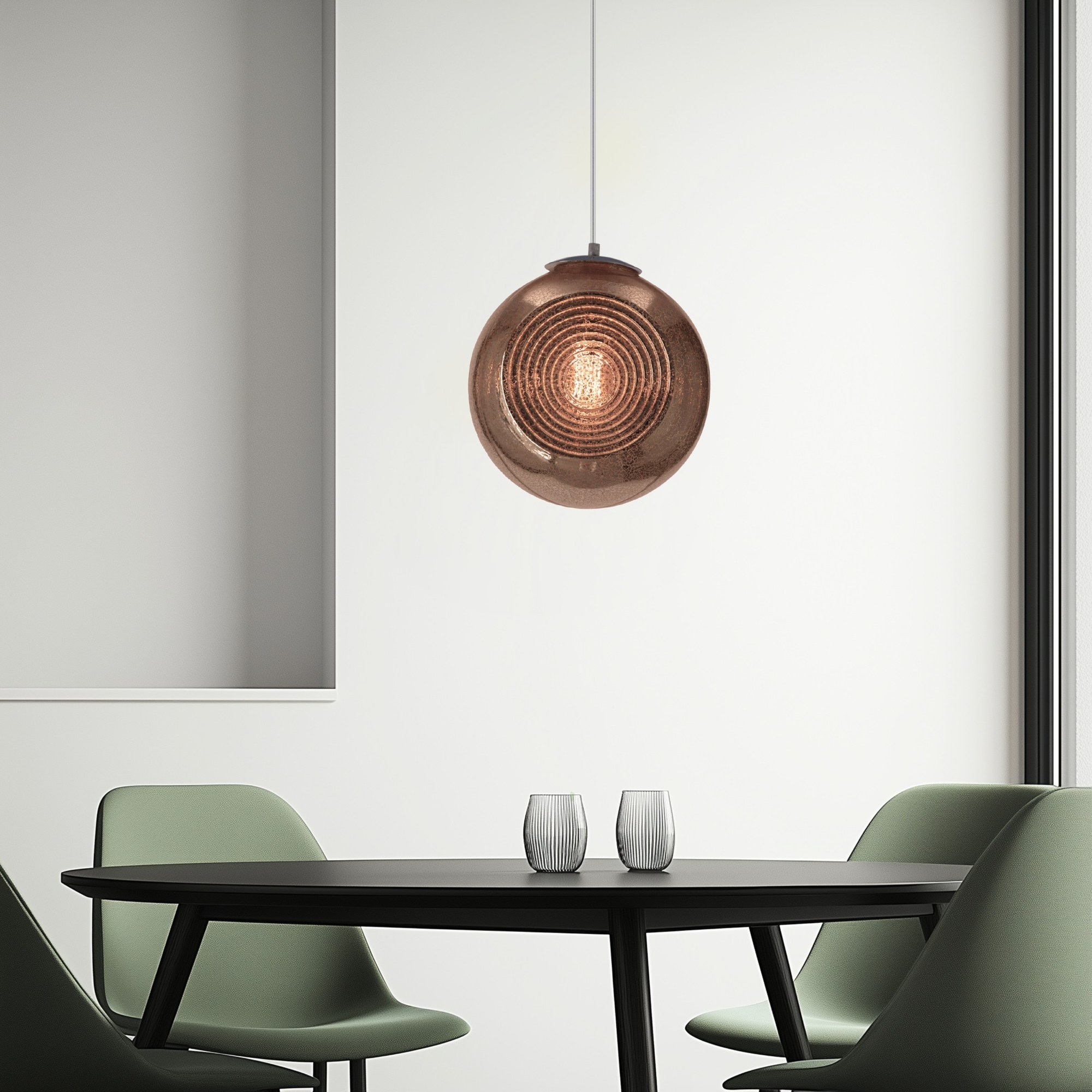 Suspension globe en verre à anneaux, vert, orange ou bronze, E27 suspension globe verre à anneaux version bronze fumé au dessus d une table noire