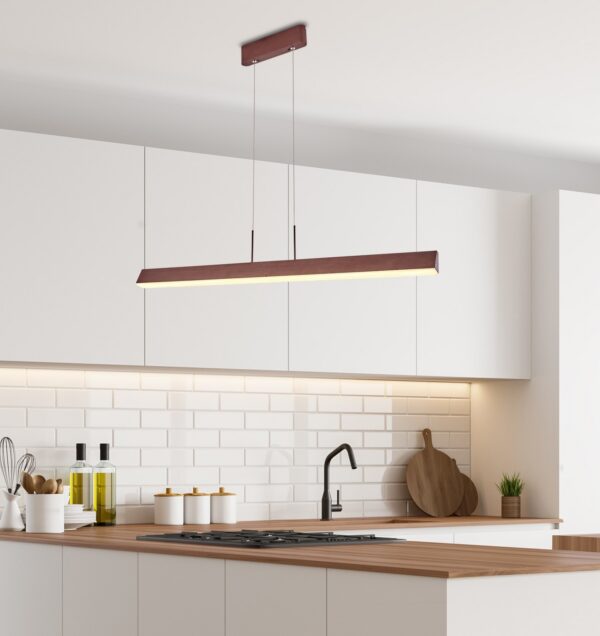 suspension linéaire LED marron au dessus d un plan de travail dans une cuisine blanche