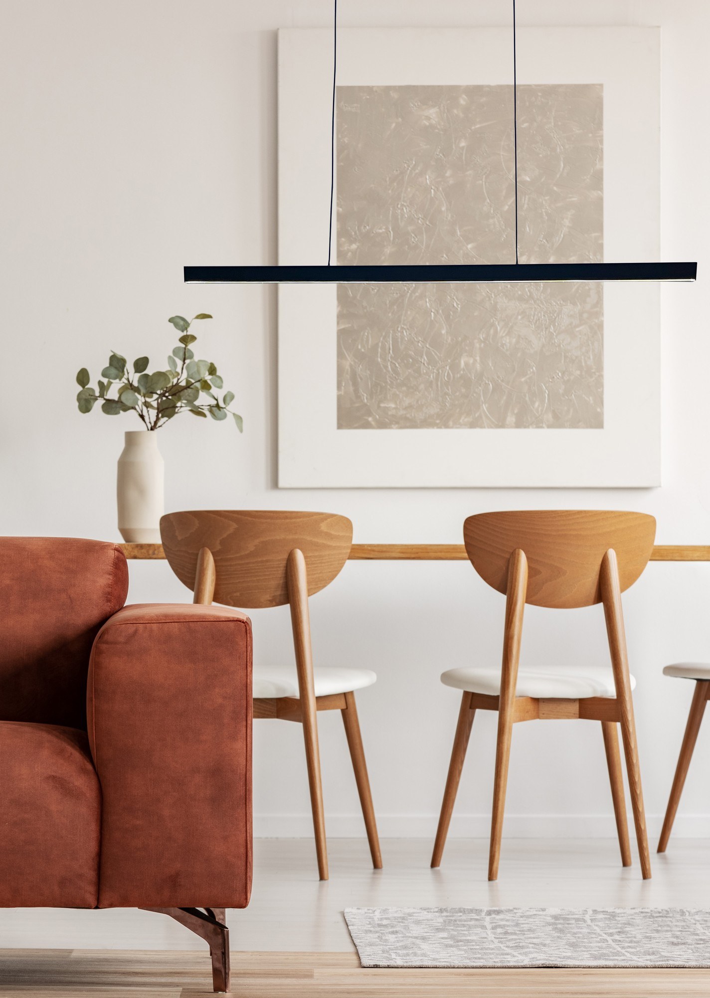suspension Volare 120 LED noire au-dessus d'une table à manger
