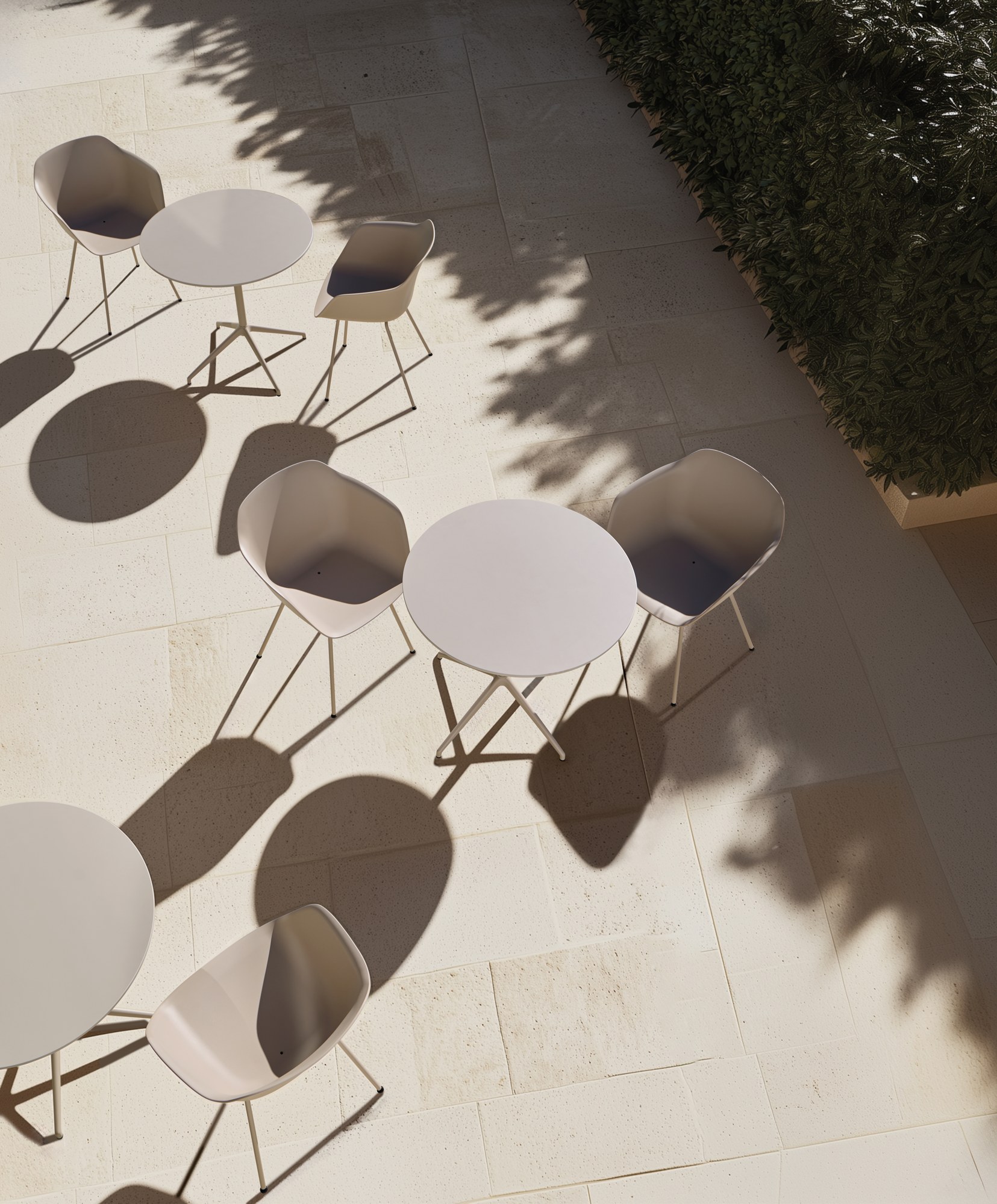 Table terrasse Barlis Outdoor par Inclass, pied 4 branches, abattante table terrasse Inclass Barlis Outdoor ronde vue du dessus avec fauteuils