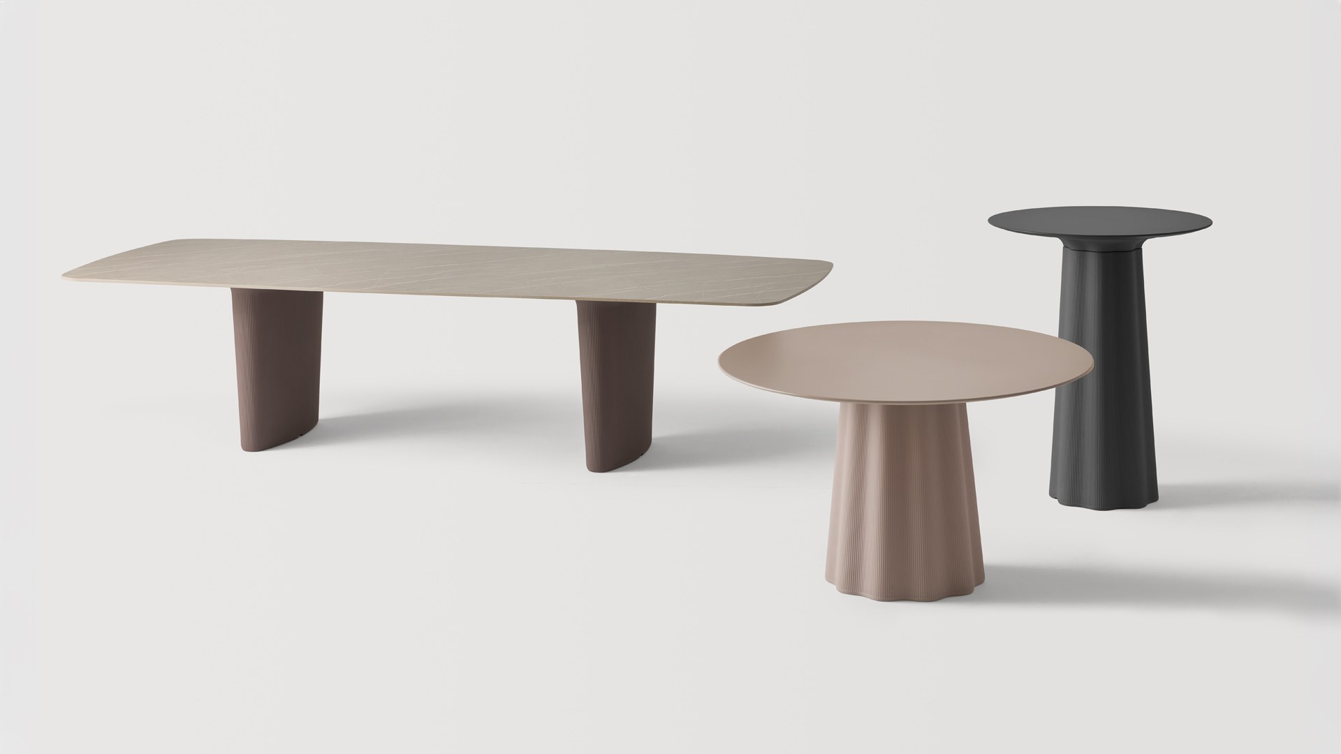 Table terrasse Ondes Outdoor par Inclass, bases sculptées en PE table terrasse Inclass Ondes Outdoor longue et rondes en situation