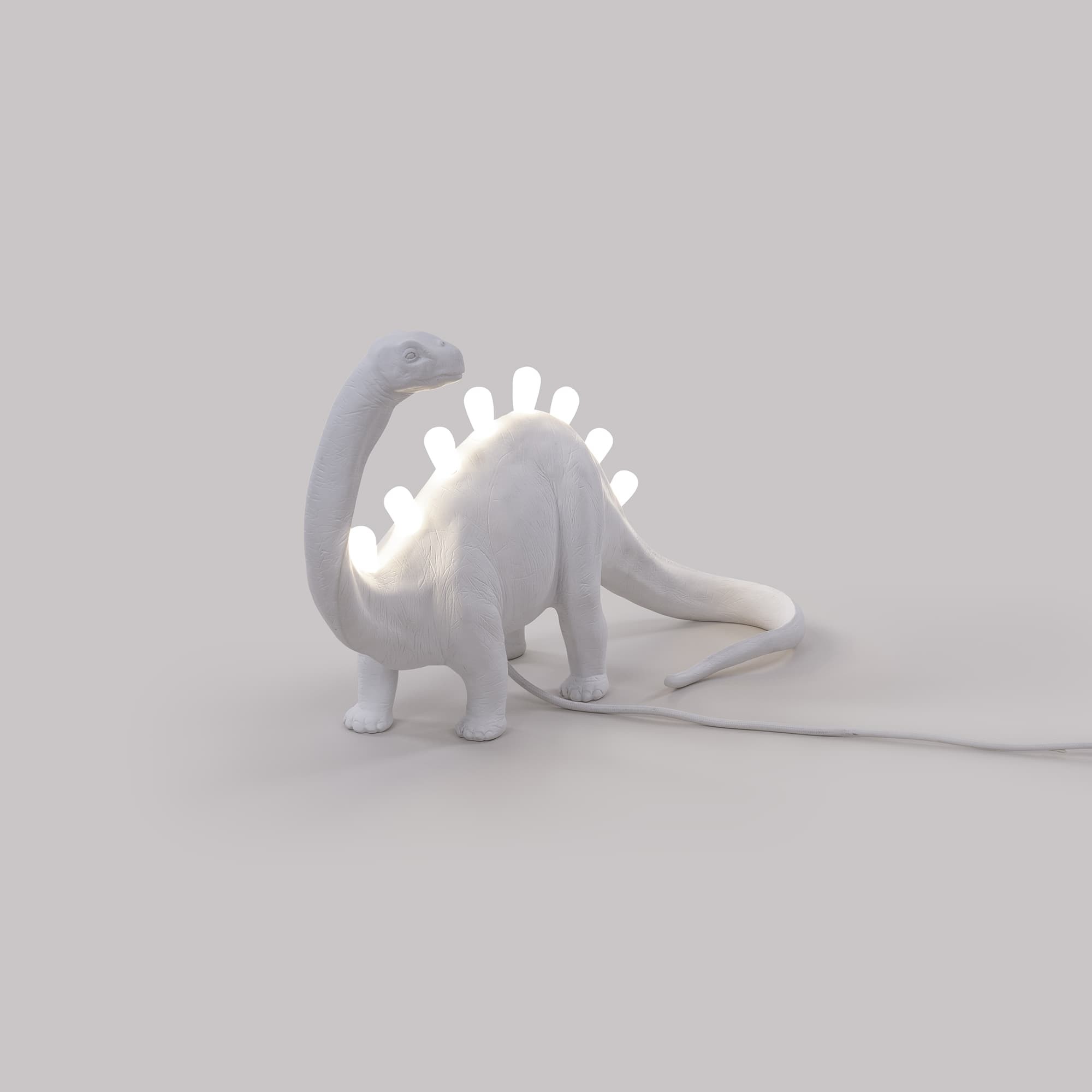 Lampe à poser Jurassic Lamp Bronto en forme de brontosaure en résine blanc par Seletti Lampe à poser Jurassic Lamp Bronto en forme de brontosaure en résine blanc par Seletti