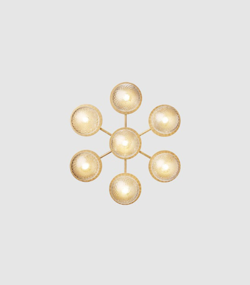 Applique Liila Star base en métal avec abat-jour en verre soufflé Optic clear au design contemporain par Sofie Refer x Nuura