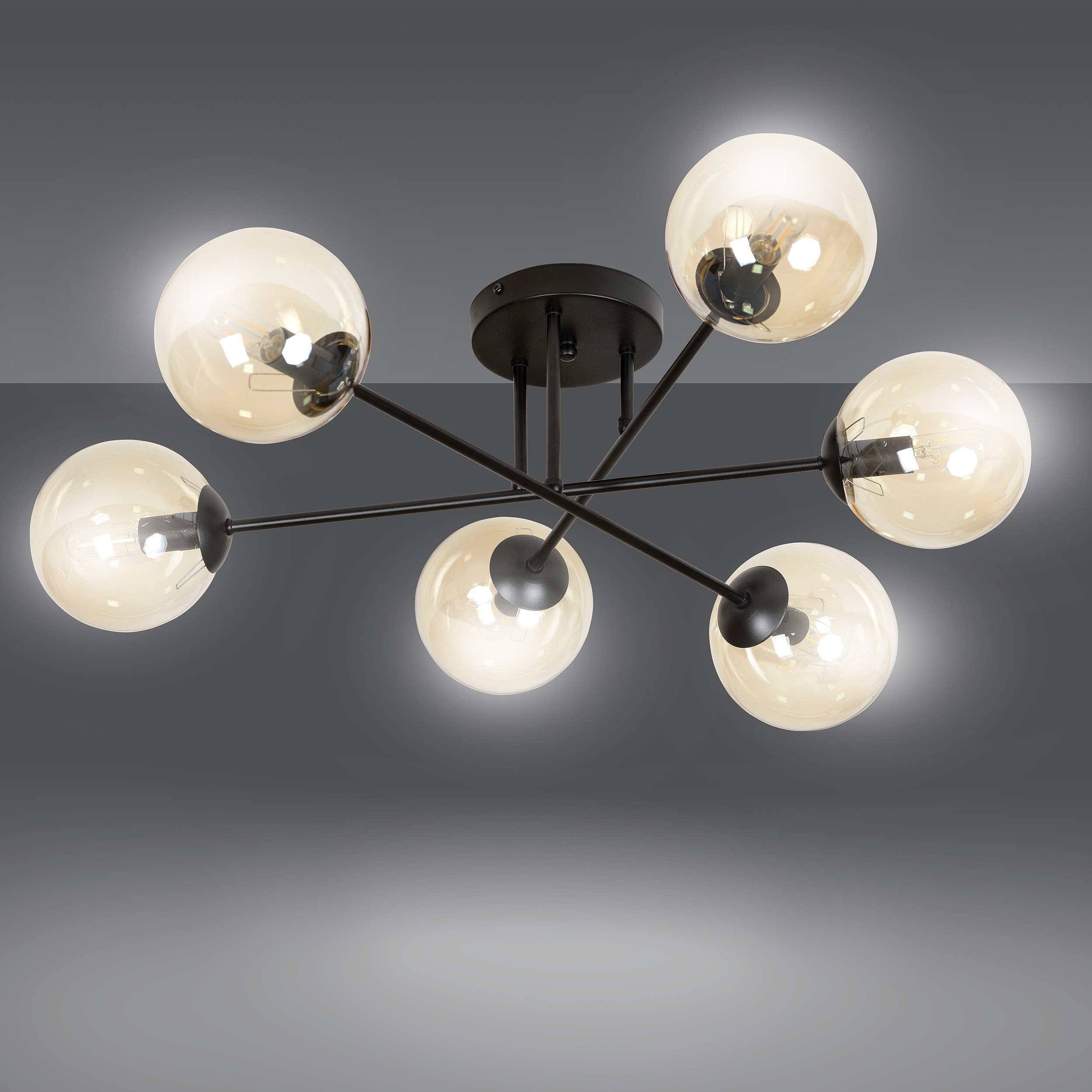 Plafonnier Brendi 6B base métal en forme d'étoile avec abat-jour boule en verre au design contemporain par Emibig Plafonnier Brendi 6B base métal en forme d'étoile avec abat-jour boule en verre au design contemporain par Emibig